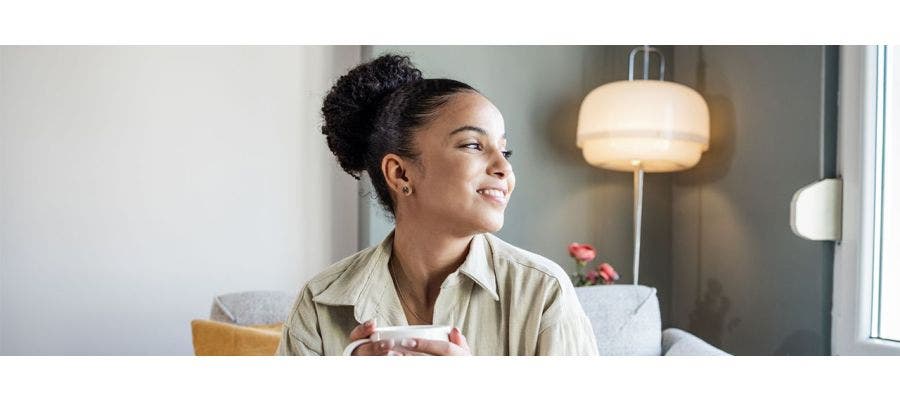 woman holding a cup of tea