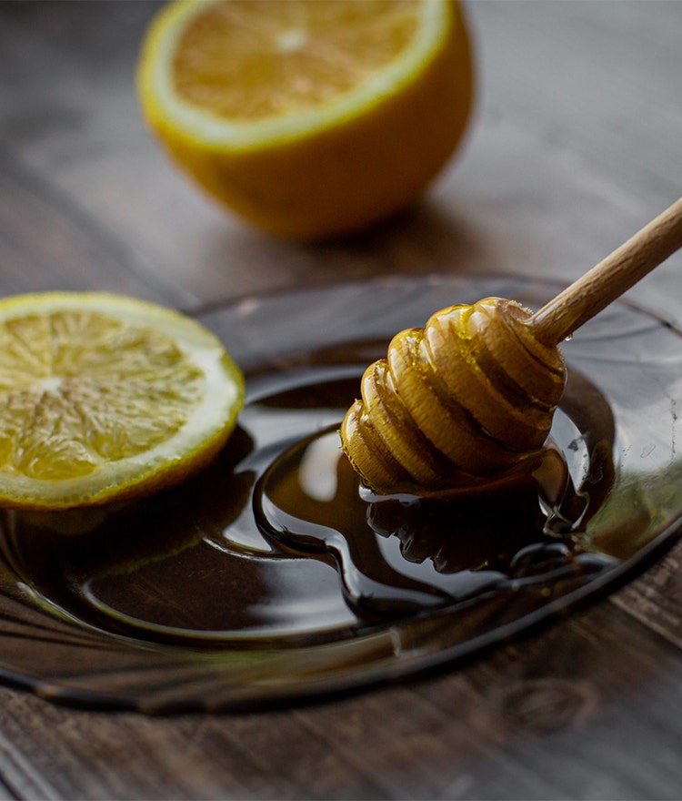 Wooden wand dipped in local honey, which can be a natural allergy remedy