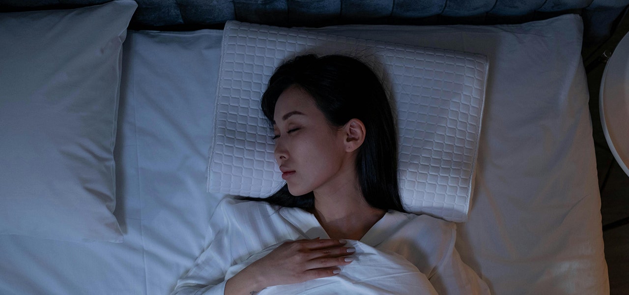 woman sleeping on her back